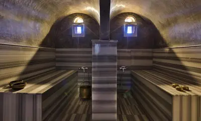 a bath room with two sinks and two windows at Palais Amador in Marrakech