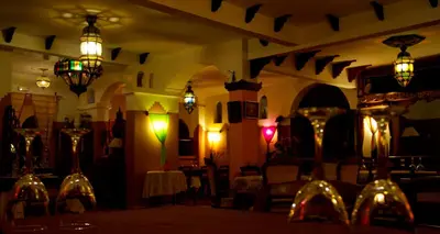a room with several glass vases and lights at Kasba Oum Hani d'Ouzoud in Ouzoud