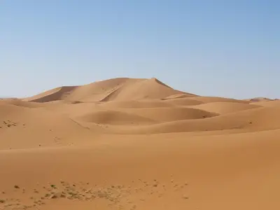 a sand dune in the desert at Desert Erg Chegaga Camp in El Gouera
