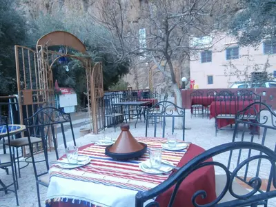 a table with a tea pot on top at Etoile des Gorges in Aït Baha