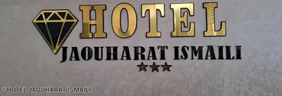 a sign for a jewellery store with a diamond on it at Hotel Jaouharat Ismaili in Meknès