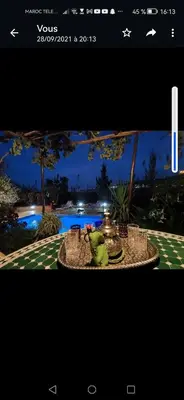 a page of a website with a picture of a table at Studio avec piscine et parking prive in Fès