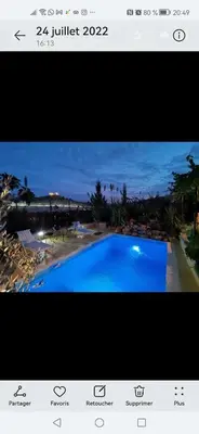 a screenshot of a picture of a swimming pool at Studio avec piscine et parking prive in Fès