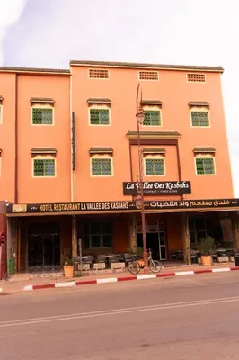 a building on the side of a street at HOTEL LA VALLEE DES KASBAHS CHEZ ILYAS in Tinerhir