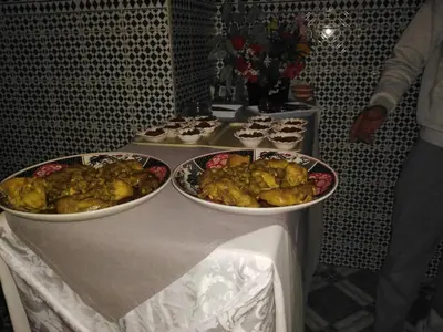 a table with two bowls of food on it at APPART AIGLE HOTEL in Ouarzazate