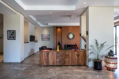 a lobby with a reception desk in a building at Villa Roseraie Isabella in Marrakech