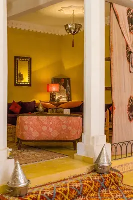 a living room with a couch and a table at Auberge Ksar Jallal in Ksar Oled Cherki