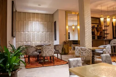 a waiting room with chairs and a table at Al Destino Villa Riad Spa Luxury Marrakech in Marrakech