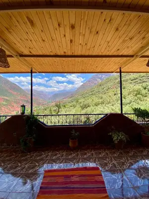 a room with a view of a mountain range at DAR EL HACHIMI EL IDRISSI in Ourika