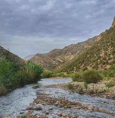 a river in a canyon with mountains in the background at TAZEKKA PARC HOTEL in Taza