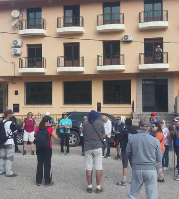 a group of people standing in front of a building at TAZEKKA PARC HOTEL in Taza