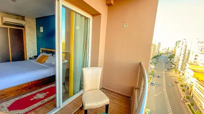 a small room with a bed and a window at Hôtel Belle Vue et Spa in Meknès