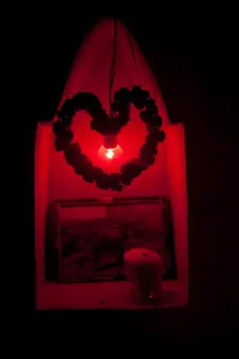 a red light with two hearts hanging from it at Kasbah Ait Kassi in Boumalne