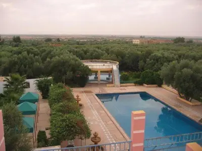 an overhead view of a swimming pool on a building at Hotel Complex Europe in Guercif