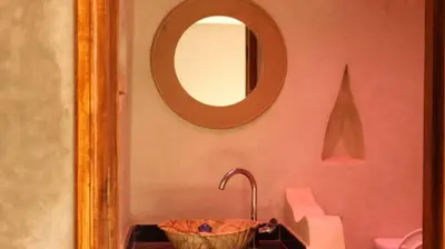a bathroom with a sink and a mirror at Villa Baraka in Marrakech