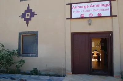 a building with a door and a hotel code restaurant at Auberge Amellagou in Amellagou