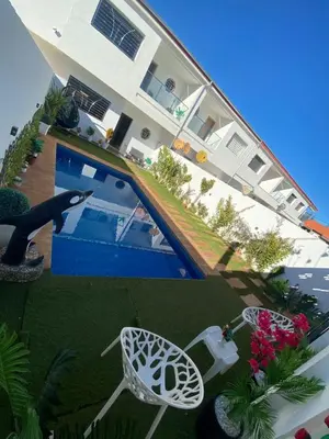 an aerial view of a house with a swimming pool at Chalet villa QUE POUR LES FAMILLES in Imouzzer Kandar