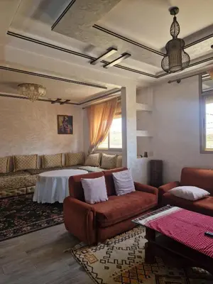 a living room with a couch and a table at Panoramic House - Midelt Family Triplexe in Midelt