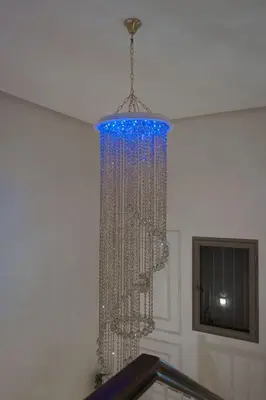 a glass chandelier hanging from a ceiling at Villa Treasure of Marrakech in Marrakech