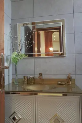 a bathroom with a sink and a mirror at Villa Treasure of Marrakech in Marrakech