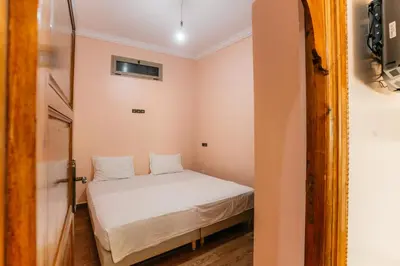 a small bedroom with a bed in a room at The best apartments of Ourika valley in Setti Fatma