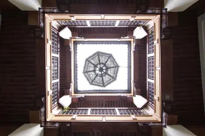 a window in a building with a snowflake at Riad Taryana in Fès