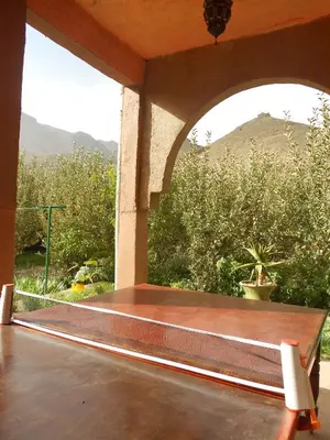 an empty porch with a view of a mountain at Safranière du M' Goun in Aguerd nʼOuzrou