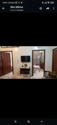 a picture of a living room with a tv at Chez-soi in Meknès