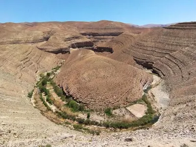 an aerial view of a canyon in the desert at ECOLODGE MISS ROSE CHEZ LA FAMILLE in Boumalne