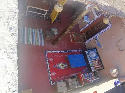 an overhead view of a room with carpets on the floor at Maison d'hôtes tilleli in Tamnougalt