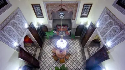 an overhead view of a living room with a ceiling at Riad Fes Palacete in Fès