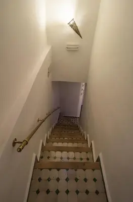 a stairway with a light at the top at Dar Chrif Idrissi in Fès