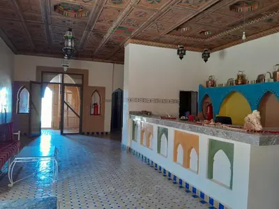 a room with a lobby with aasteryasteryasteryasteryasteryasteryasteryasteryastery at SANDSTAR PALACE in Merzouga