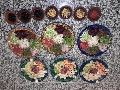 a group of plates of food on a table at SANDSTAR PALACE in Merzouga
