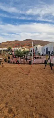 a red heart in the middle of a field at marvelous luxury desert stars in Merzouga