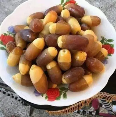 a plate of potatoes on a white plate at El Menzeh Foundation in Rissani