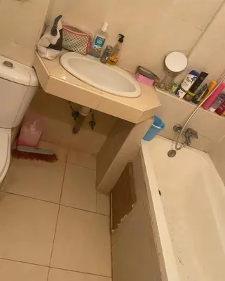 a bathroom with a sink and a toilet and a tub at تازة in Taza