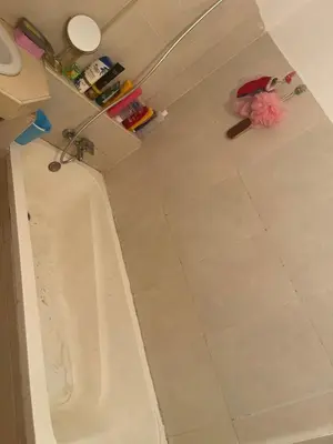 a bathroom with a shower with a bath tub at تازة in Taza