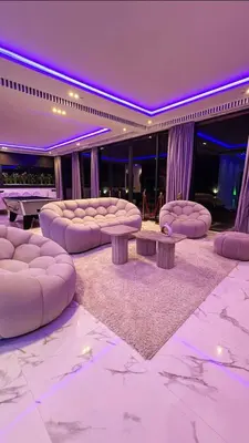 a living room with couches and a table at Villa moderne Marrakech in Marrakech