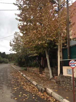 a no parking sign in front of a house at Ighbola Ouzoud in Ouzoud