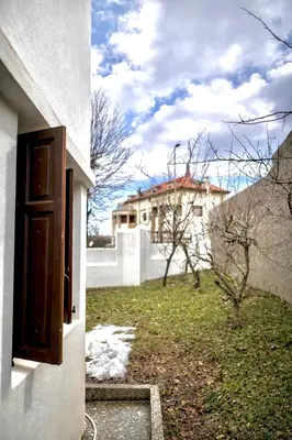 an open door of a house with a yard at Villa jouhara in Ifrane