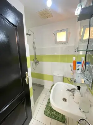 a bathroom with a sink and a toilet at Oued fes hay molay driss in Fès