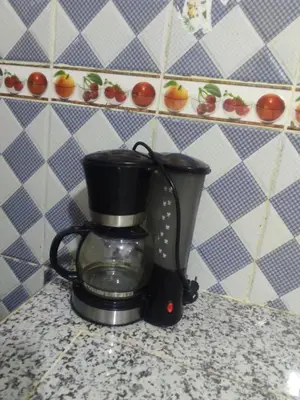 a coffee maker sitting on top of a counter at Amina appartement in Azrou