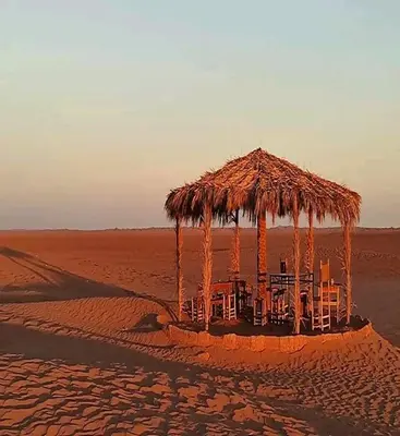 a hut in the middle of the desert at AUBERGE SAHARA IRIKI & Désert Tours in Foum Zguid