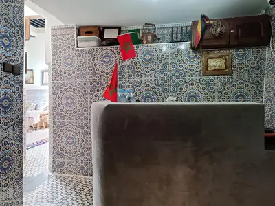 a kitchen with a counter top in a room at Riad Basma Fes - Tranquil Getaway in Fès