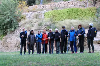 a group of people are posing for a picture at Gite Skoura in Caïd Bou Malla