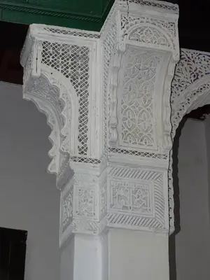 a white ornate ceiling with a green roof at Riad Amimi Fes in Fès