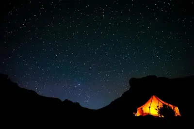 a tent under a starry sky at night at Land of dreams in Nkob