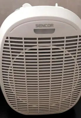 a close up of a white toaster on a table at Bel appartement calme est bien équipé in Meknès