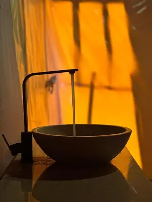 a bowl sitting on top of a table at Desert Bliss Luxury Camp in Merzouga